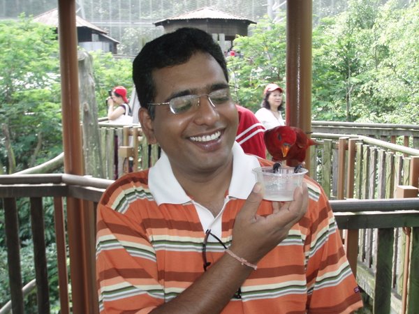 Pramod is happy so is parrot.jpg